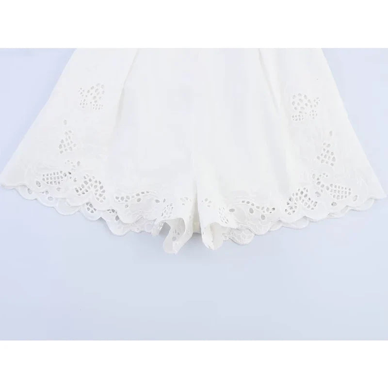 YENKYE Fashion Hollow Out Embroidery Pleated White Shorts Women High Waist Casual Summer pantalones cortos