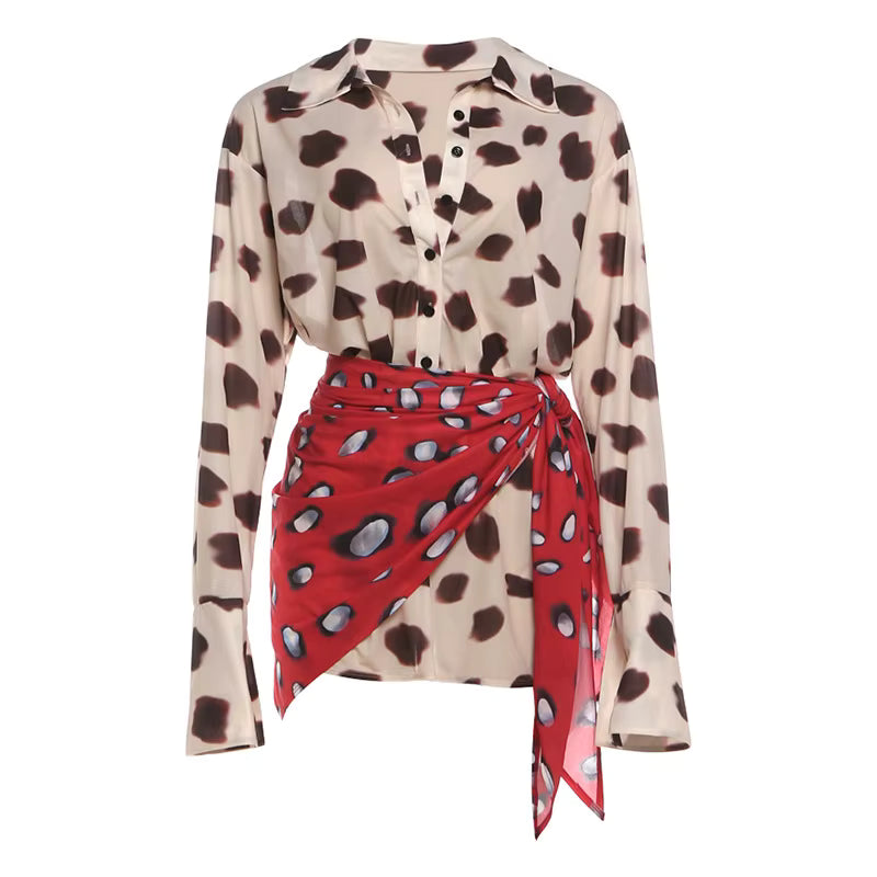Beige blouse with brown polka dots and red skirt with white polka dots on a white background